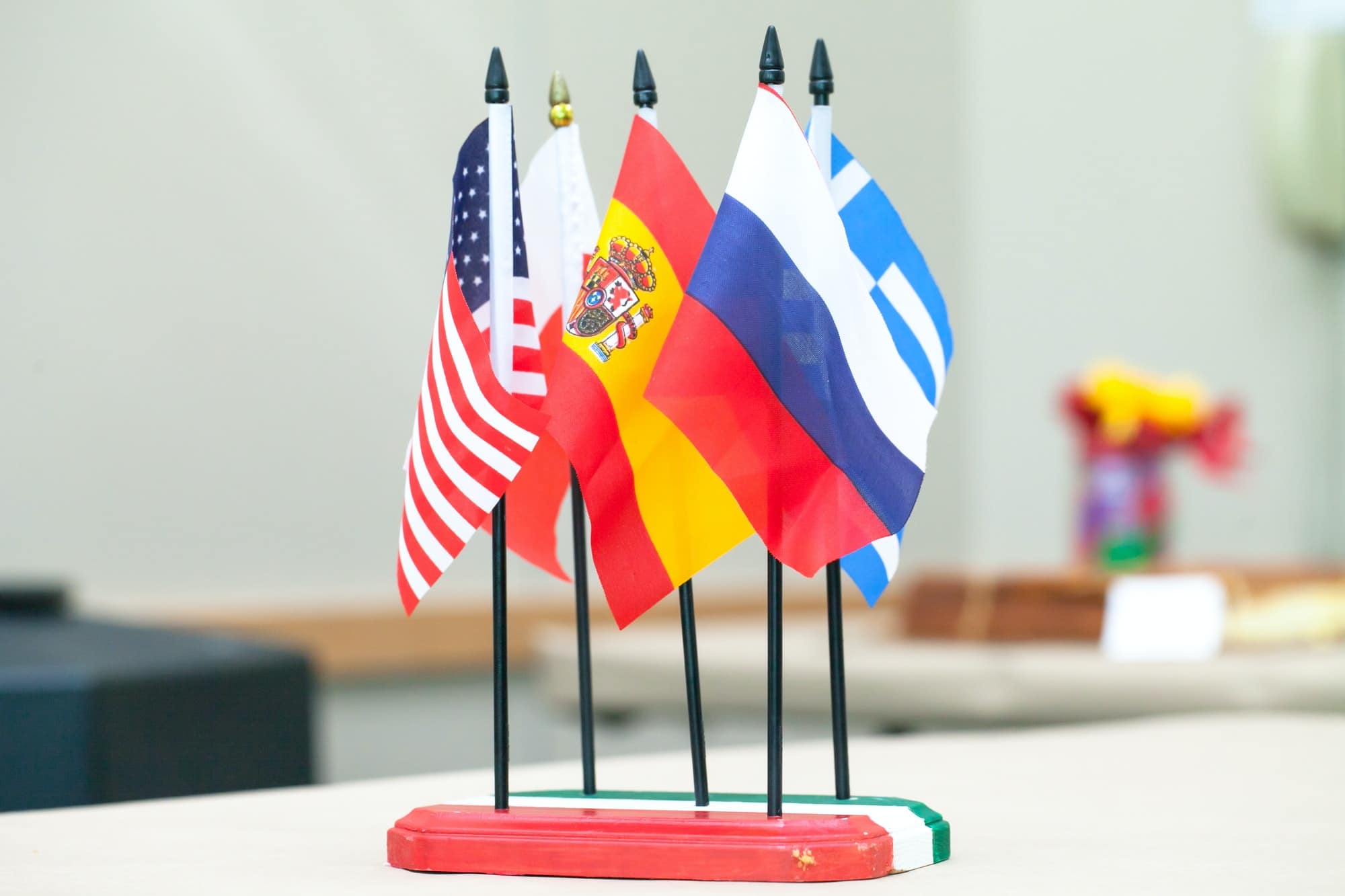 International colored flags . State flags of US, Spanish,Poland,Greece, and the Russia